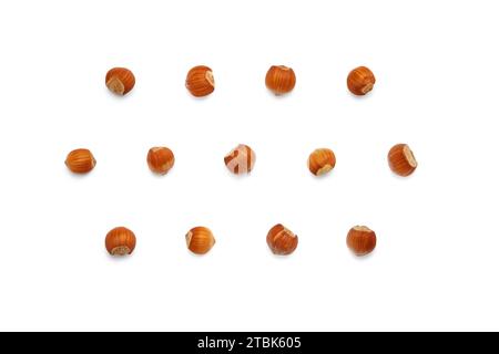 Background from hazelnut in shell. Isolated on white background. Flat lay, top view Stock Photo