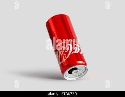 Chisinau, Moldova December 4 2023: Aluminum can of Cola view from an angle on a gray background. With clipping path Stock Photo