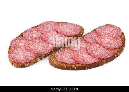 Two sandwiches with salami isolated on white background. Stock Photo
