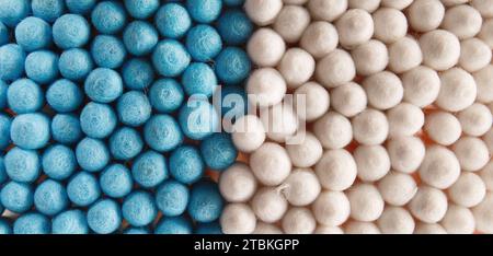 Abstract background of multi-colored cotton swabs, sticks, buds. Texture of hygienic cotton buds, macro shot. Stock Photo