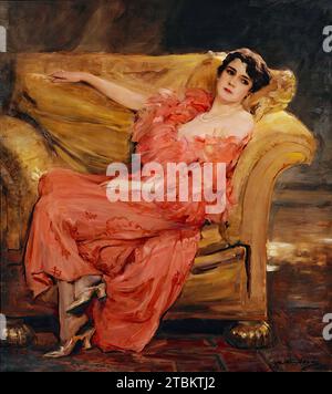 Luise Eisner, later Princess Odescalchi, 1926. The sitter is stretched sideways in a seated position in a large yellow chair, looking at the viewer; her right arm rests on the chair's back cushion, her left arm on her lap, her legs crossed, wearing golden slippers. Dress: red patterned silk dress with color-coordinated feather edging of the décolleté and a single-row pearl necklace and pearl ring. Living interior merely indicated by a carpet. Stock Photo