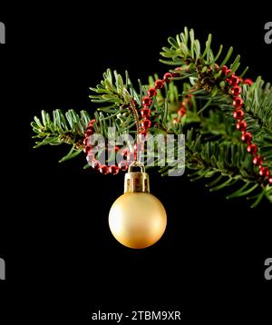 Christmas ball with beads on fir tree, closeup Stock Photo - Alamy