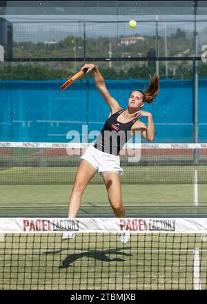 Young woman playing padel tennis at the Club Robinson in Ugento, Apulia, Italy Stock Photo