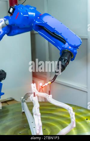 Automatic robotic arm for metal welding operations Stock Photo
