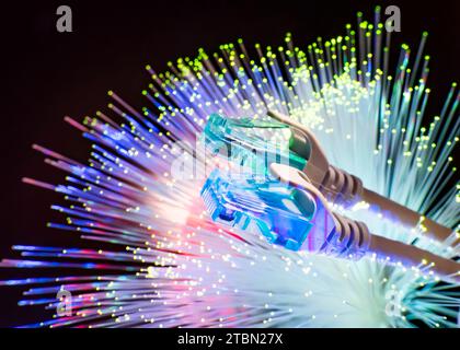 network cables closeup with fiber optical background Stock Photo