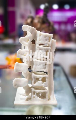 3d printed human spine in 3d printer. Stock Photo