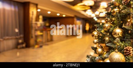 Christmas and new year decorations in hotel resort reception area, beautiful interior in waiting area. Stock Photo
