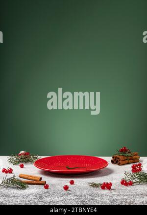 Empty red plate on Christmas setting background Stock Photo