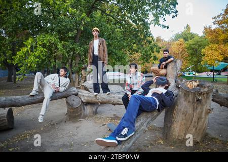 group of young people relaxing in the park Stock Photo