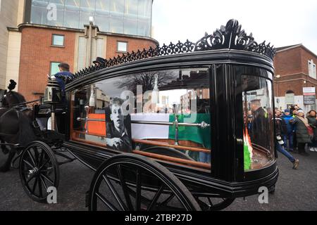 The funeral procession of Shane MacGowan starts from outside Shelbourne Park Stadium as it makes its way through the streets of Dublin ahead of his funeral in Co Tipperary. The songwriter, who found fame as the lead singer of London-Irish punk/folk band The Pogues, died at the age of 65 last week. Picture date: Friday December 8, 2023. Stock Photo