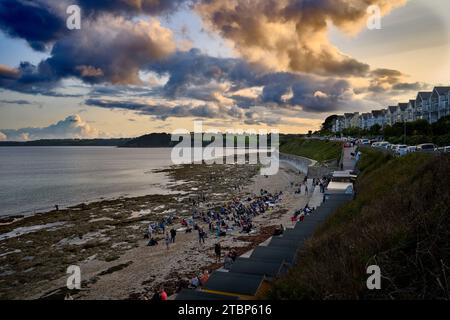 Beach party at sunset on Castle Beach, Falmouth Stock Photo