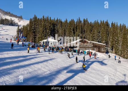 A group of people enjoying an outdoor winter activity in Are, Sweden Stock Photo