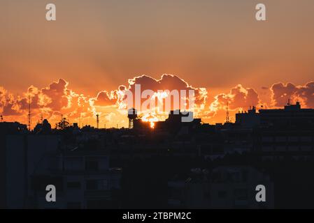 A stunning sunset illuminating buildings in Limassol, Cyprus Stock Photo