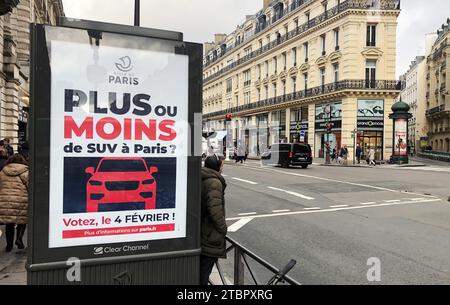 Paris, France. 08th Dec, 2023. On a billboard, the city of Paris informs about a citizen survey on increased parking fees for SUVs. Credit: Michael Evers/dpa/Alamy Live News Stock Photo