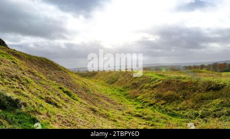The defensive ramparts of Badbury Rings, Dorset - John Gollop Stock Photo