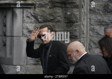 Johnny Depp arrives for the funeral of Shane MacGowan at Saint Mary's of the Rosary Church, Nenagh, Co. Tipperary. MacGowan, who found fame as the lead singer of London-Irish punk/folk band The Pogues, died at the age of 65 last week. Picture date: Friday December 8, 2023. Stock Photo