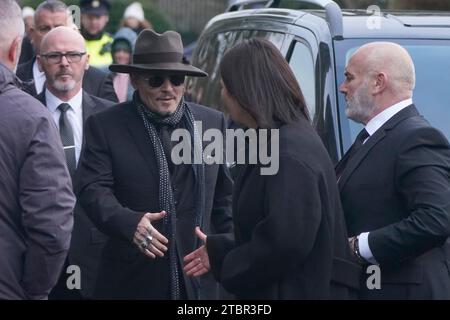 Johnny Depp arrives for the funeral of Shane MacGowan at Saint Mary's of the Rosary Church, Nenagh, Co. Tipperary. MacGowan, who found fame as the lead singer of London-Irish punk/folk band The Pogues, died at the age of 65 last week. Picture date: Friday December 8, 2023. Stock Photo