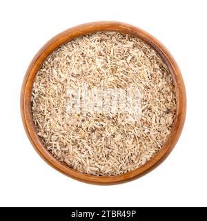 Dried cut Siberian ginseng root in a wooden bowl. Eleutherococcus senticosus, also called eleuthero or devils bush. Extracts are used in TCM. Stock Photo