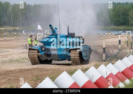 ALABINO, RUSSIA - AUGUST 19, 2022: Tank T-72B3 of the team of the Republic of Abkhazia on the tank biathlon track. International War Games Stock Photo