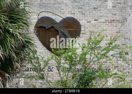 Heart shaped logo on the side of the Cardiac & Vascular Institute in Gainesville, Florida. Stock Photo