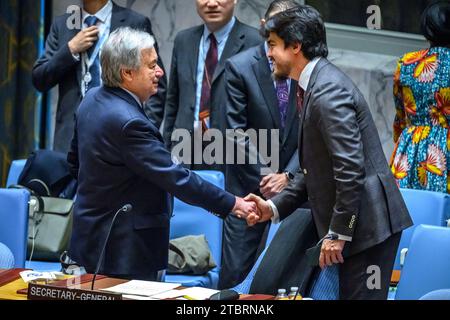 New York, USA, 8th Dec. 2023. Ambassador José de la Gasca of Ecuador, president of the Security Council in December (R) greets United Nations Secretary-General Antonio Guterres before the start of a meeting of the UN Security Council on the situation in the Middle East, including the Palestinian question. Credit: Enrique Shore/Alamy Live News Stock Photo