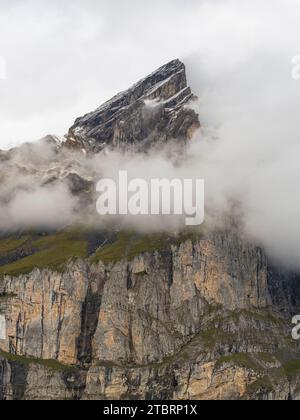 The Blüemlisalp Rothorn near Kandersteg shrouded in clouds. Stock Photo