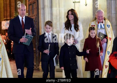 The Prince of Wales, Prince George, Prince Louis, the Princess of Wales and Princess Charlotte, leaving after the Royal Carols - Together At Christmas service at Westminster Abbey in London. Picture date: Friday December 8, 2023. Stock Photo
