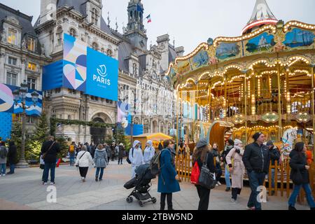 Paris, France, 1st of december 2023, City hall with merry go round at a place de Hotel de Ville in Paris, Editorial only. Stock Photo