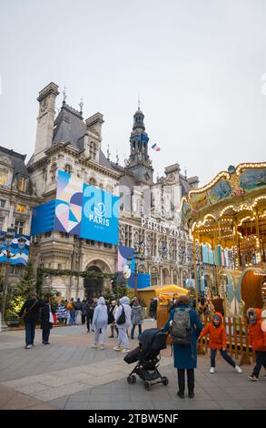 Paris, France, 1st of december 2023, City hall with merry go round at a place de Hotel de Ville in Paris, Editorial only. Stock Photo