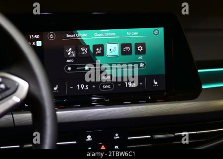 Car air conditioning panel on the luxury car console. Car climate control. Stock Photo