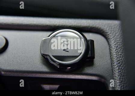 12V power outlet socket in the car Stock Photo