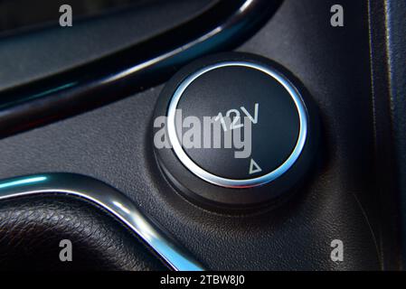 12V power outlet socket in the car Stock Photo