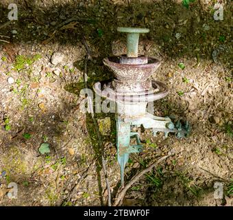 used suspension insulator laying on the ground Stock Photo