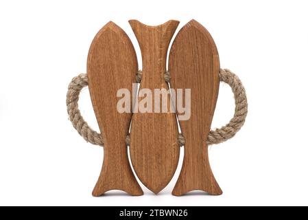 Fish shaped natural wood serving tray with rope handles isolated on white background Stock Photo