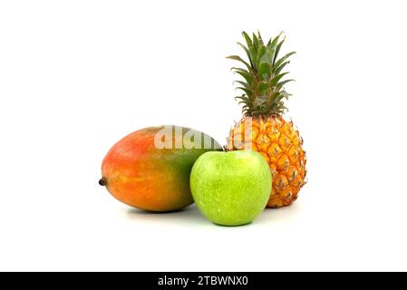 Whole mango, pineapple fruit and apple isolated on a white background Stock Photo