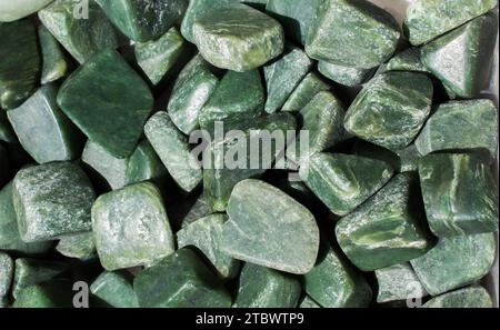 Jade gem stone as natural mineral rock specimen Stock Photo