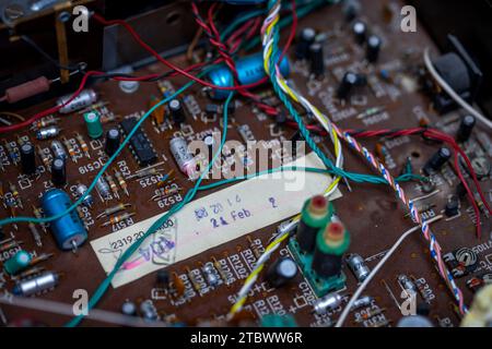 Schwerin, Germany. 28th Nov, 2023. A circuit board with electronic components in a music system from the GDR company RFT is repaired in a small workshop for old radios, record players and hi-fi systems. Small electrical appliances from East and West have been restored to working order here for around 34 years. Regular customers with a soft spot for GDR radio technology in particular hand in their devices to the trained radio and television technician. A lack of spare parts and declining interest among younger customers mean that the days of this unique work Credit: dpa/Ģ����ý Live News Stock Photo