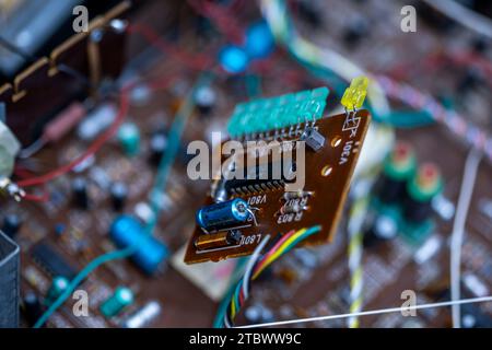 Schwerin, Germany. 28th Nov, 2023. A circuit board with electronic components in a music system from the GDR company RFT is repaired in a small workshop for old radios, record players and hi-fi systems. Small electrical appliances from East and West have been restored to working order here for around 34 years. Regular customers with a soft spot for GDR radio technology in particular hand in their devices to the trained radio and television technician. A lack of spare parts and declining interest among younger customers mean that the days of this unique work Credit: dpa/Ģ����ý Live News Stock Photo