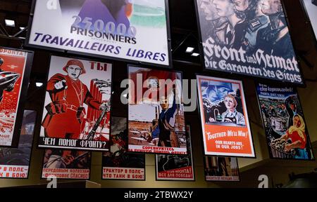 A picture of multiple posters related to the war economy, taken inside the Museum of the Second World War, in Gdansk Stock Photo