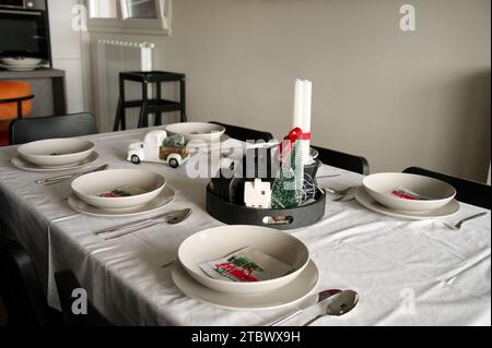 Table decorated for Christmas dinner Stock Photo