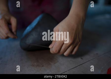Close up of pottery making process. Leisure activity and small business concept. Stock Photo
