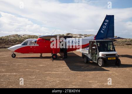 A Falkland Islands Government Air Service, FIGAS, Britten Norman Islander aircraft, VP-FMC, at Sea Lion Island, Falkland Islands. Stock Photo