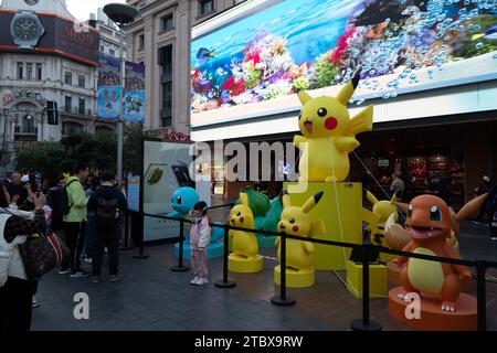 Shanghai, China. 09th Dec, 2023. A Pokemon Pikachu is being seen on the Nanjing Road Pedestrian Street in Shanghai, China, on December 8, 2023. (Photo by Costfoto/NurPhoto) Credit: NurPhoto SRL/Alamy Live News Stock Photo