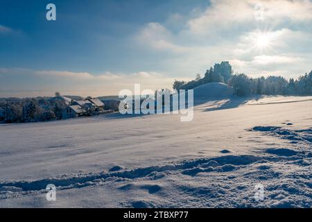 Snowy and beautiful winter landscape in Waldburg in Upper Swabia. View to the snow-covered castle Stock Photo