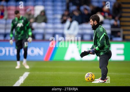 London, UK. 9th Dec 2023. Alisson of Liverpool warms up during the Premier League match between Crystal Palace and Liverpool at Selhurst Park, London on Saturday 9th December 2023. (Photo: Federico Guerra Maranesi | MI News) Credit: MI News & Sport /Alamy Live News Stock Photo