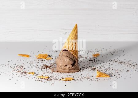 Chocolate ice cream cone drop upside down Stock Photo