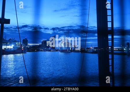 Impression of the old port of Hamburg on the Elbe in the early morning,, Germany Stock Photo