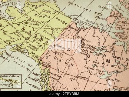 A vintage/antique political map in sepia showing Alaska and Canada. Stock Photo