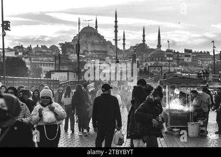 Istanbul, Turkey - NOV 22, 2021: View from the streets in Eminonu, generic architecture on the European side of Istanbul. Suleymaniye Mosque in the ba Stock Photo