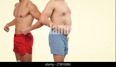 photo of men with belly abs comparison, copy space. belly abs comparison of men Stock Photo